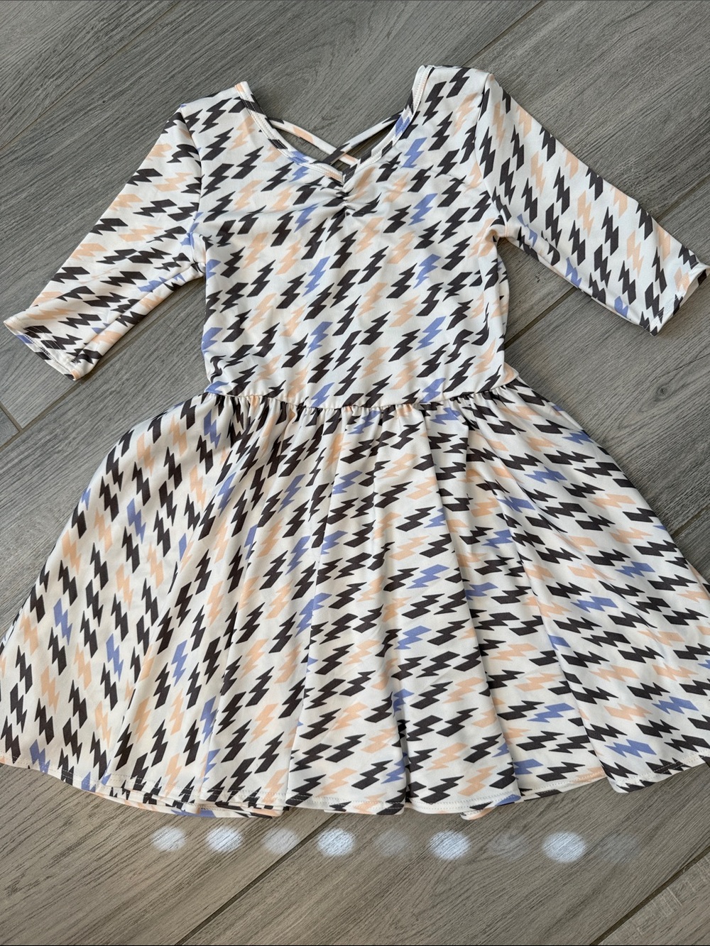 Dot Dot Smile Beige, Black & Blue Zigzag Swing Dress